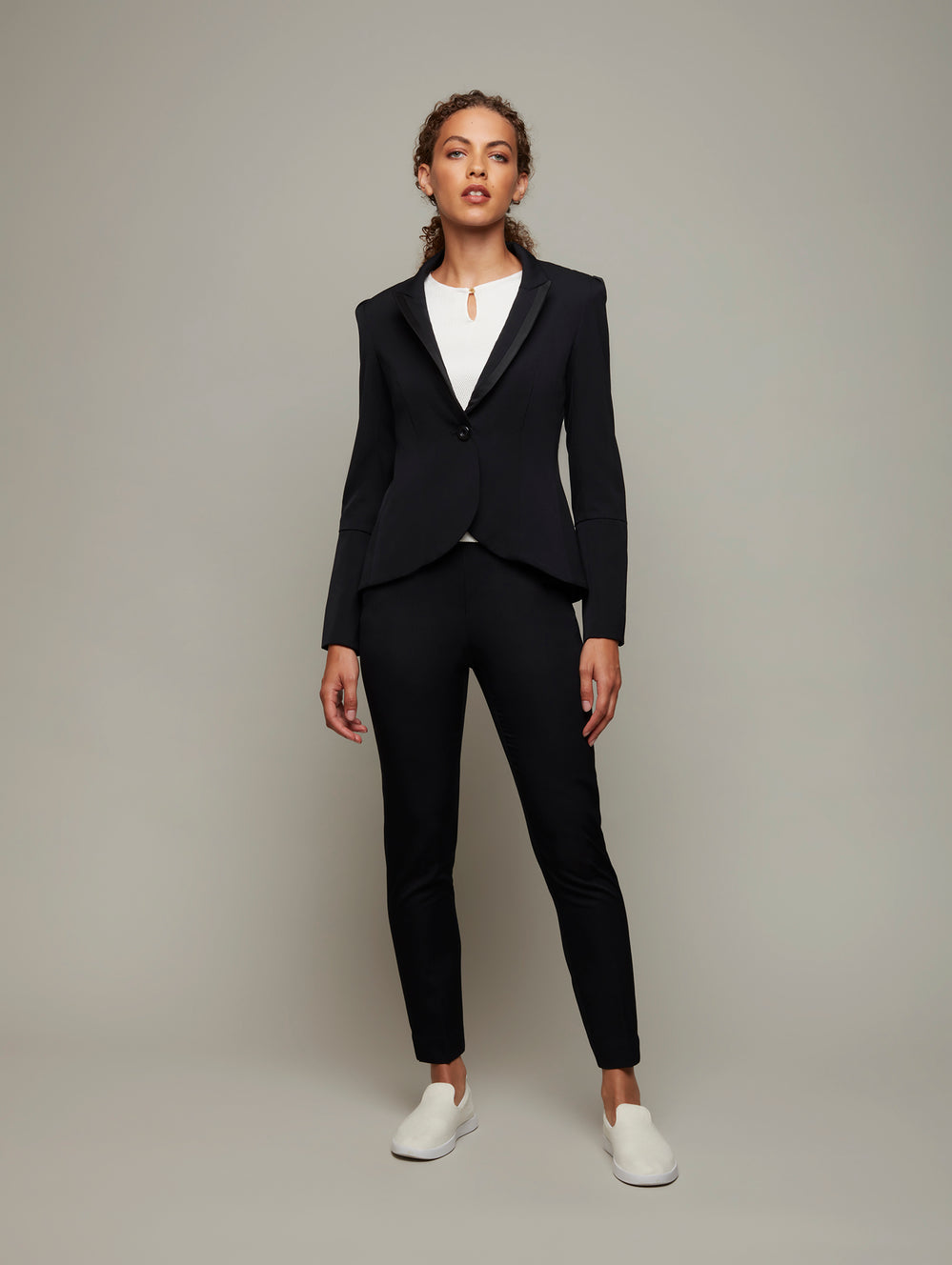 DEPLOY womenswear fitted black suiting tux jacket front view