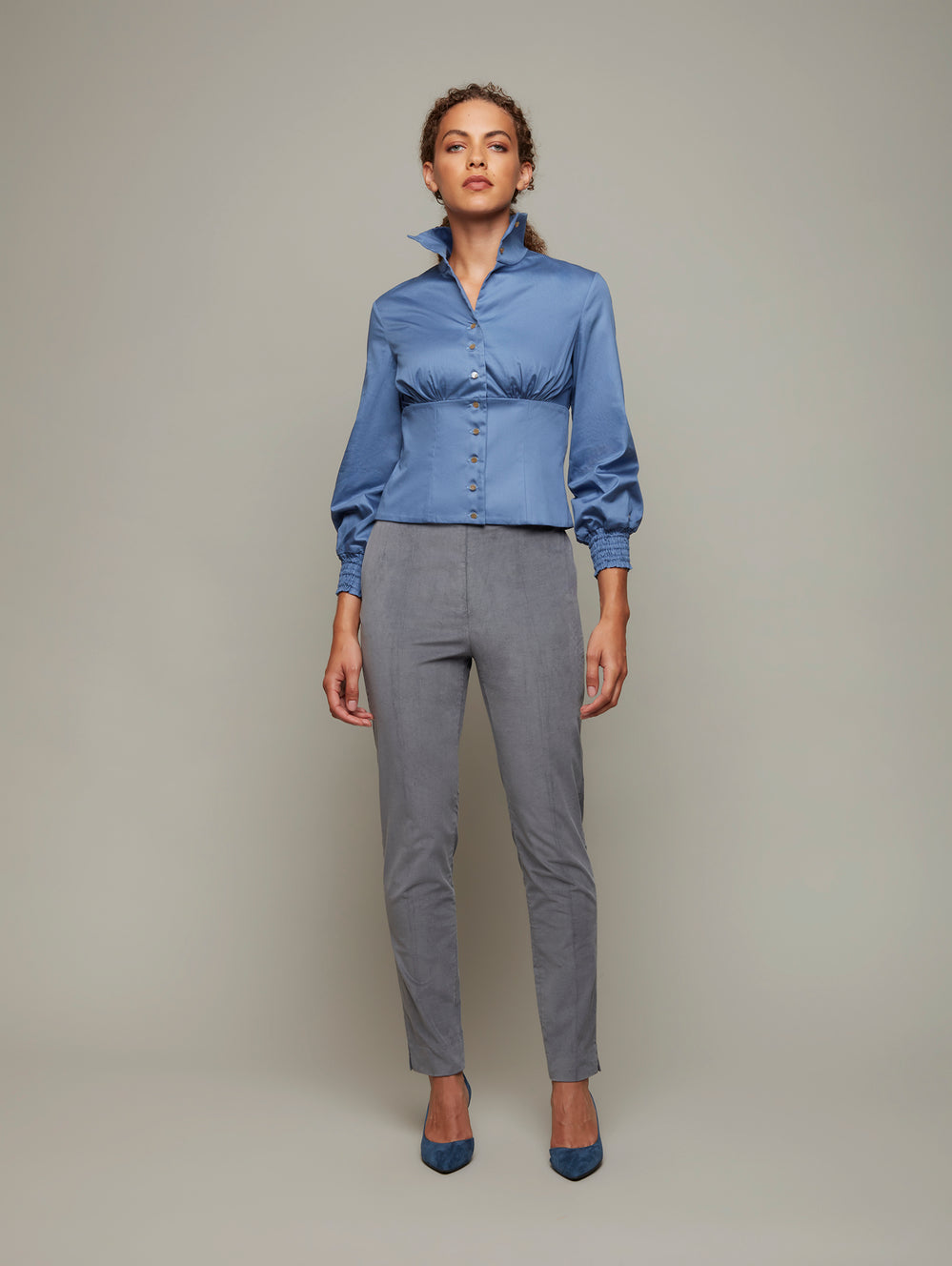 DEPLOY womenswear ruched high collar dusty blue fitted shirt front view