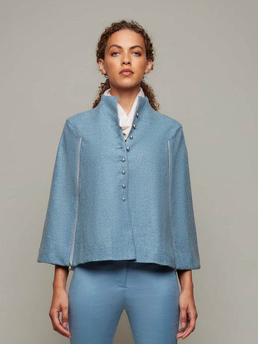 DEPLOY womenswear light blue wool tweed cape front view
