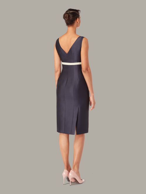 Front view of empire-cut fitted dress in Midnight Blue, available from British sustainable fashion brand DEPLOY