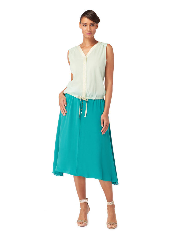 Front view of AZALEA 3-way tea dress as skirt in Emerald Green, available from British sustainable fashion brand DEPLOY