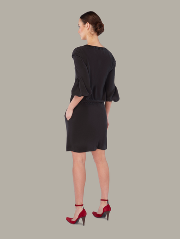 Back view of MOKARA 2-way silk shift dress in black, available from British sustainable fashion brand DEPLOY