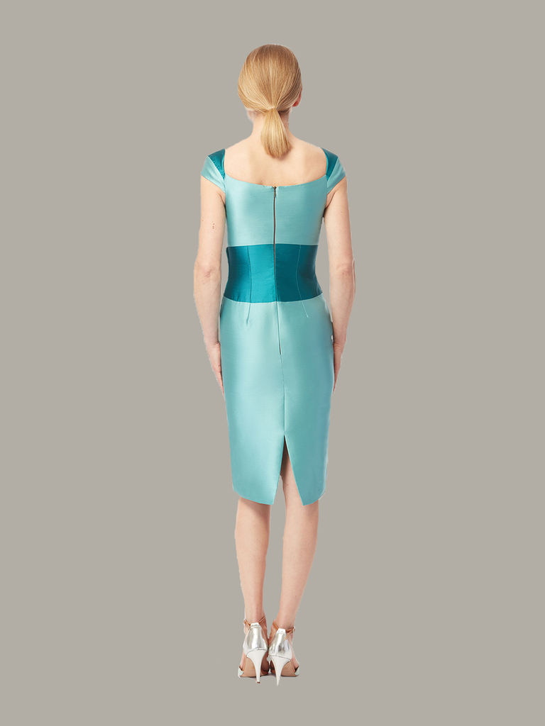 Back view of two-tone fitted dress in lagoon-teal, available from British sustainable fashion brand DEPLOY