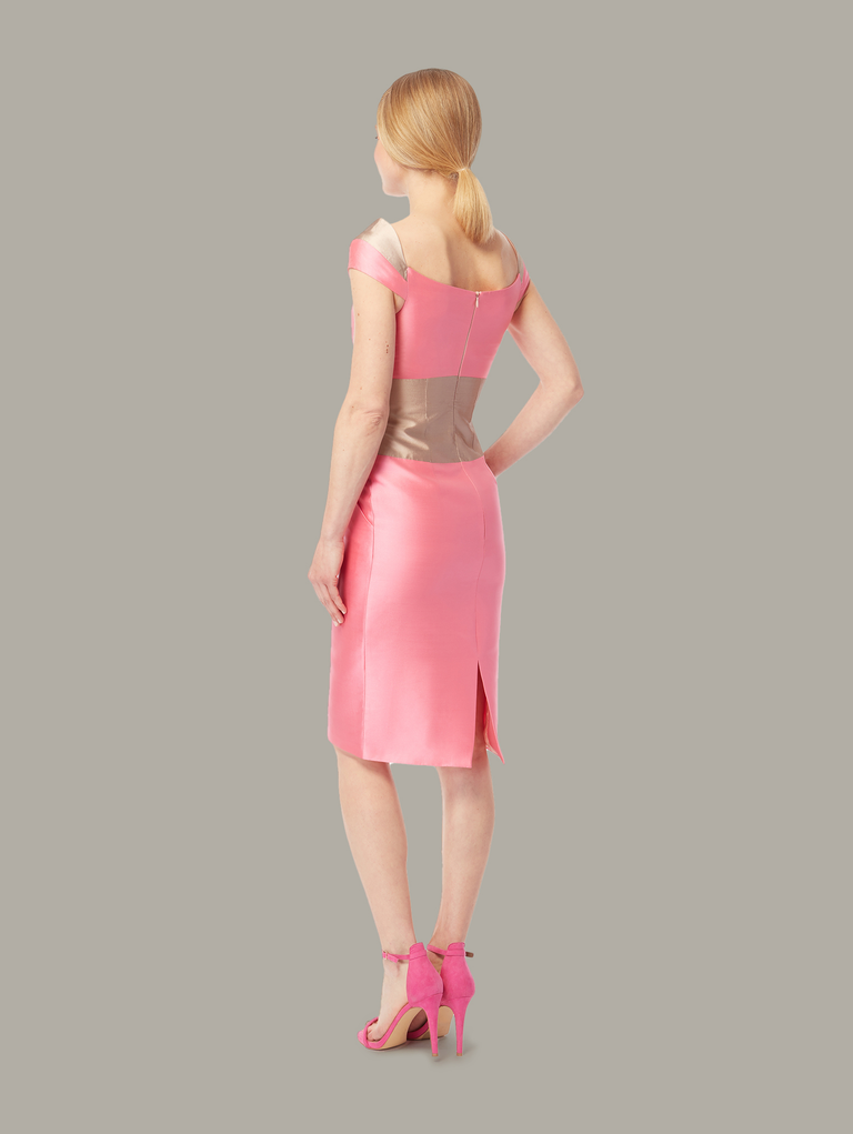 Back view of two-toned fitted occasion dress in pink and rose-gold, available from British sustainable fashion brand DEPLOY