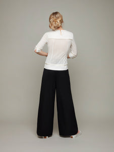 Back view of ALOE Panelled 3/4 Sleeve Top in Porcelain White, available from British sustainable fashion brand DEPLOY