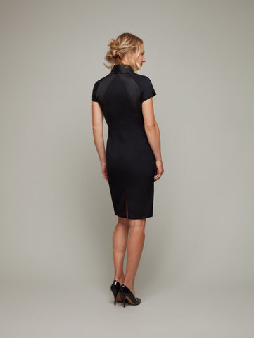 Back view of CORNICE fitted panelled dress in Black.