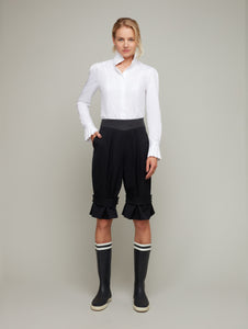 Front view of FORMERET Pin-Tuck Culottes in Black, available from British sustainable fashion brand DEPLOY