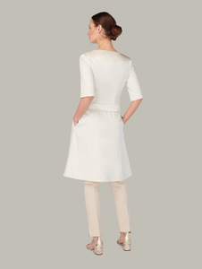 Back view of LINDEN 4-way dress coat in Birch, available from British sustainable fashion brand DEPLOY