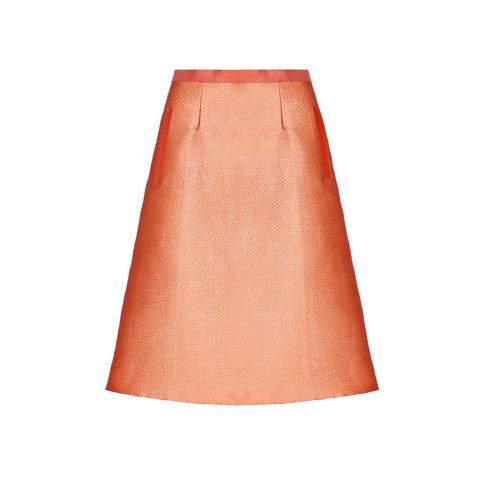 Ecommerce shoot of high-waist a-line skirt in peach blush, available from British sustainable fashion brand DEPLOY